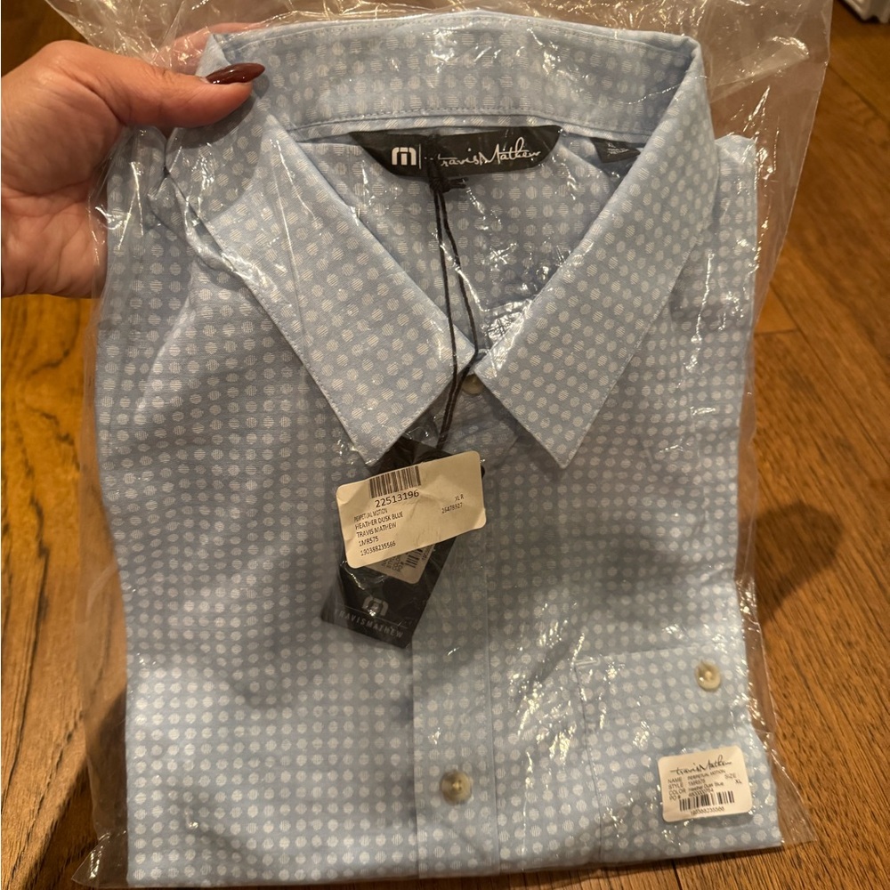 Travis Mathew’s short sleeve shirt. Size XL